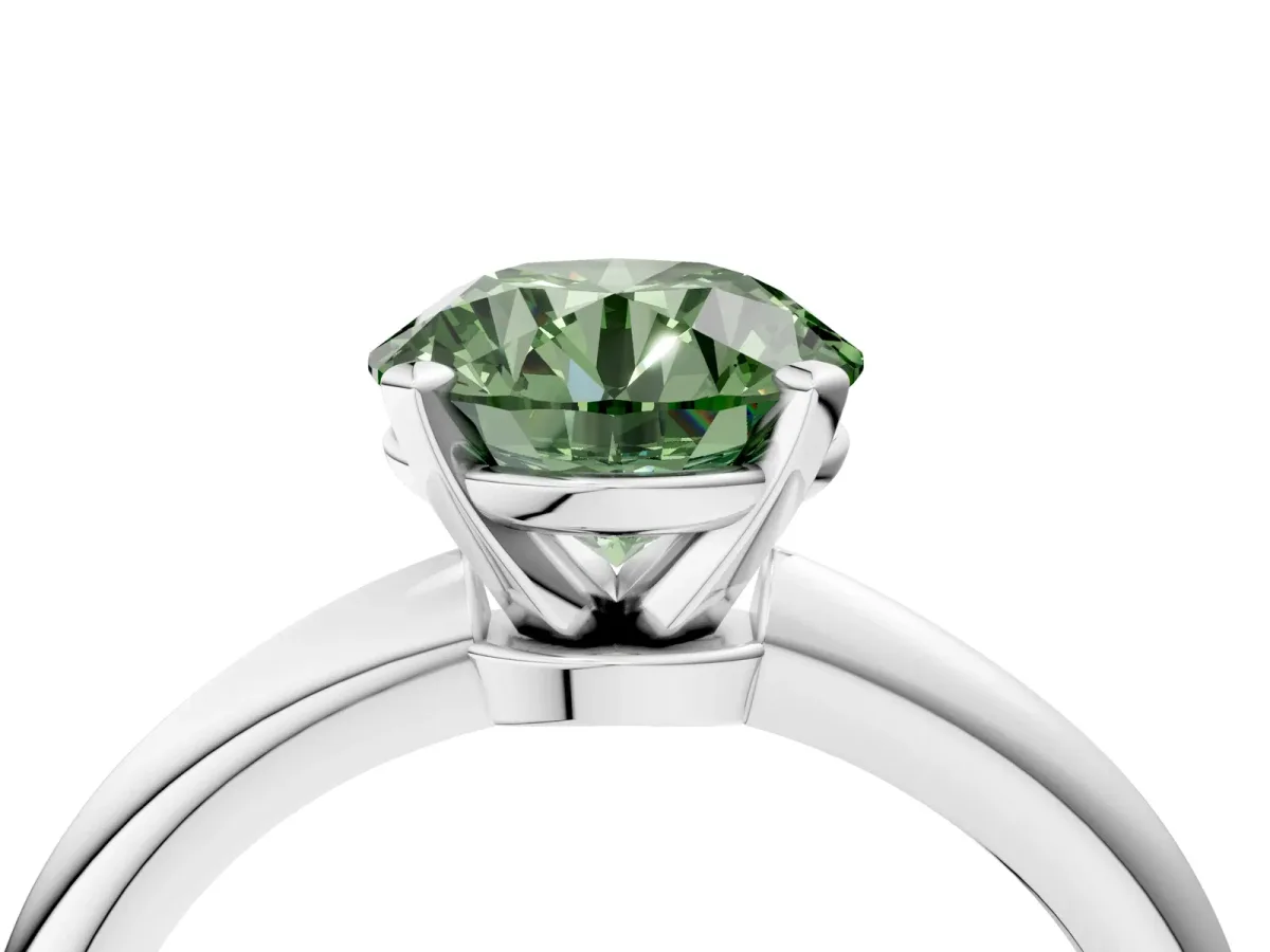 Fancy Green Round Cut Diamond Solitaire Ring with Six-Prong Setting and Classic Band Silver