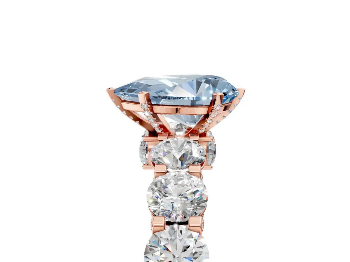Fancy Blue Pear Cut Diamond Side Stone Engagement Ring with Four-Prong Setting Rose gold