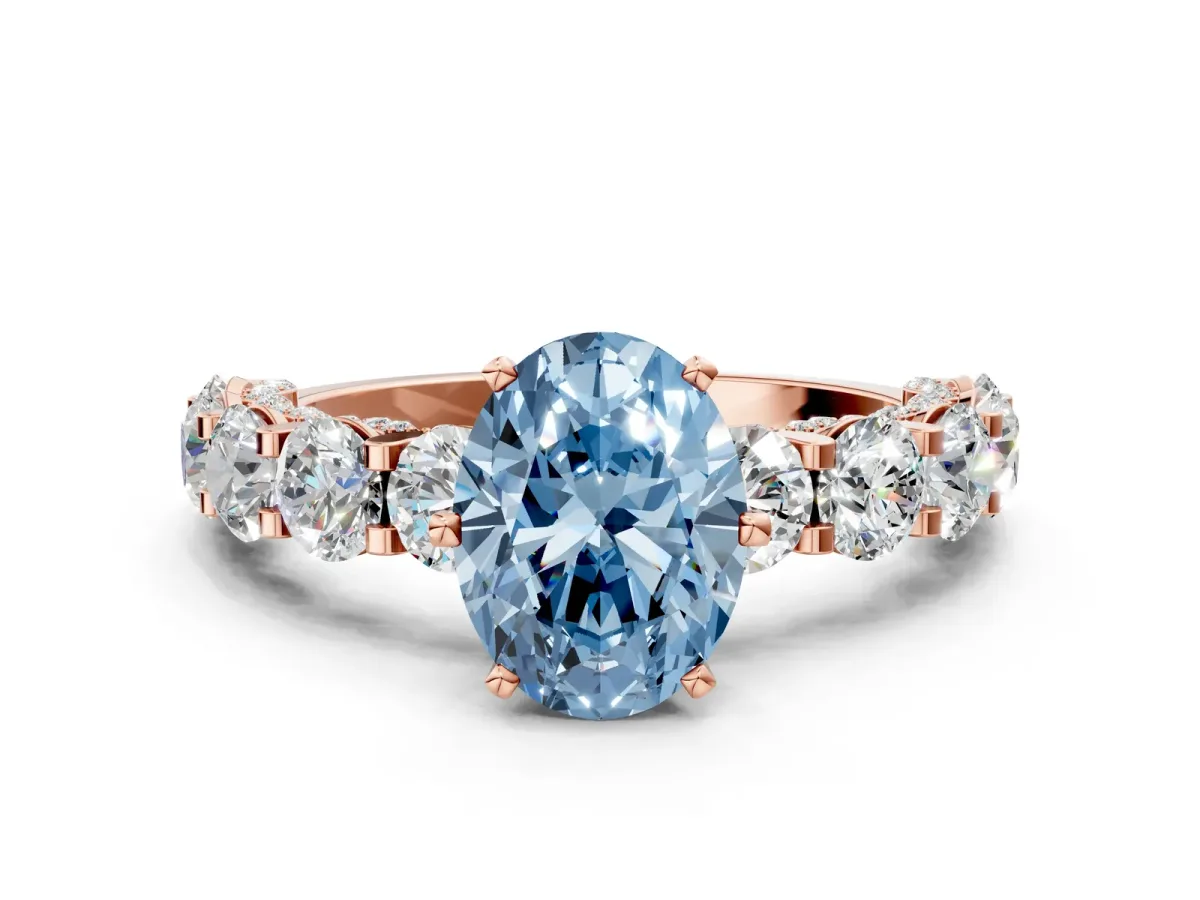 Fancy Blue Oval Cut Diamond Side Stone Engagement Ring with Four-Prong Setting Rose gold