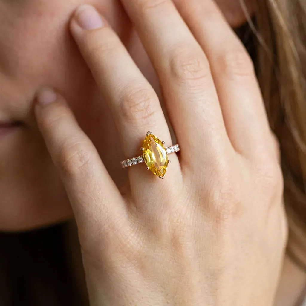 Marquise Cut Yellow Sapphire Solitaire Ring with Round Pavé Band and Four-Prong Setting Rose gold