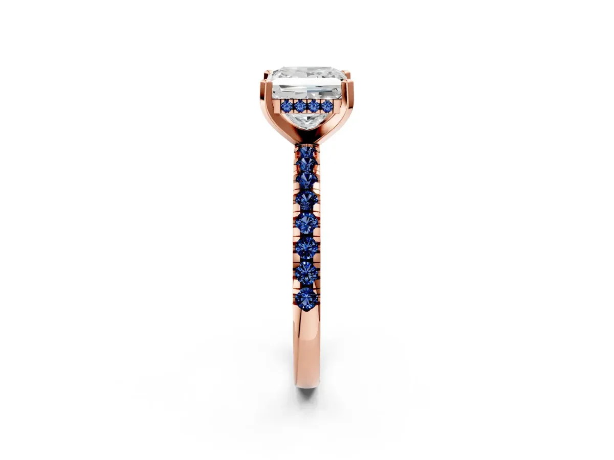 Princess Cut Diamond Solitaire Ring with Round Blue Sapphire Pavé Band and Four-Prong Setting Rose gold