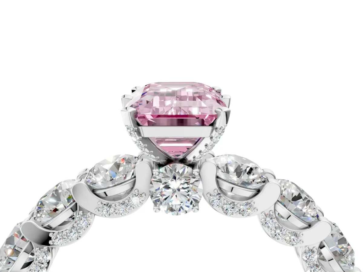 Fancy Pink Emerald Cut Diamond Side Stone Engagement Ring with Four-Prong Setting Platinum