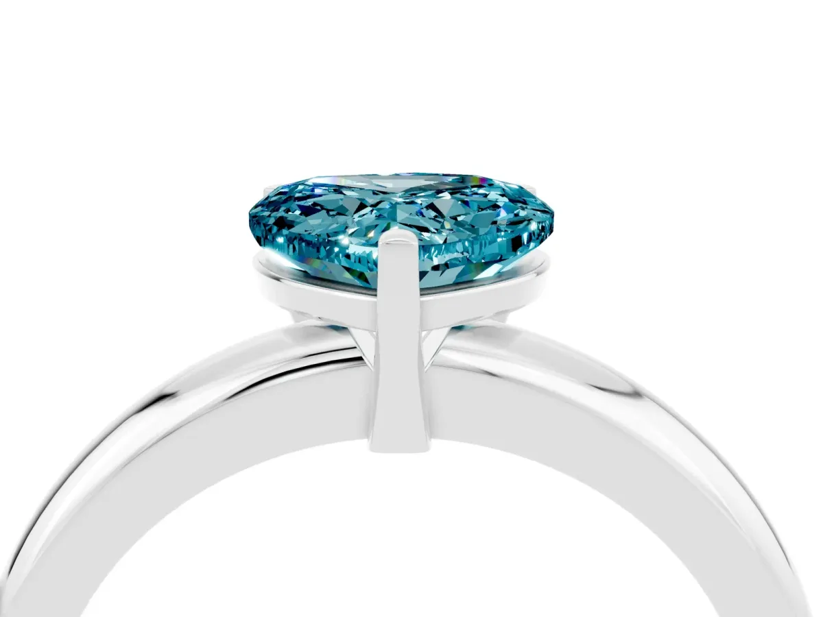 Heart Cut Blue Topaz Solitaire Engagement Ring with Round Band and Four-Prong Setting White gold