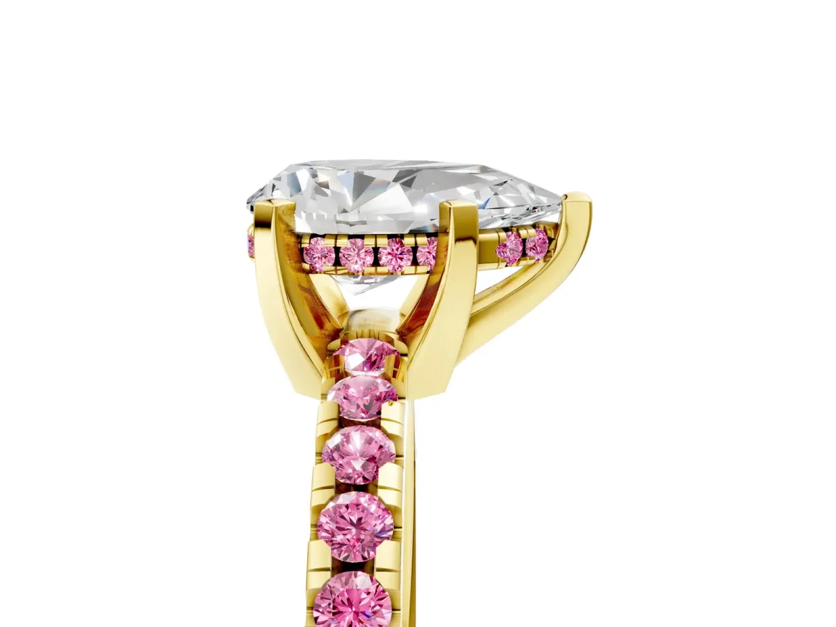 Pear Cut Diamond Solitaire Ring with Round Pink Sapphire Pavé Band and Four-Prong Setting Yellow gold