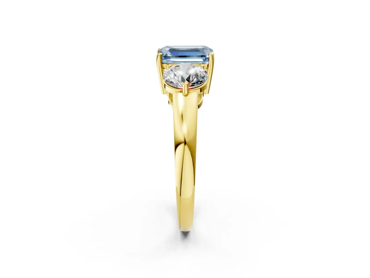 Fancy Blue Emerald Cut Diamond Three-Stone Ring with Prong Setting and Classic Band Yellow gold