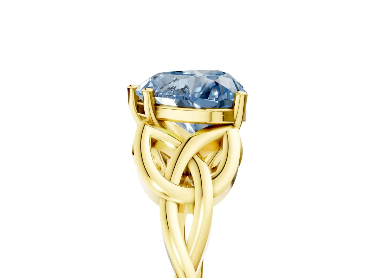 Fancy Blue Heart Cut Diamond Solitaire Engagement Ring with Celtic Knot Band and Four-Prong Setting Yellow gold