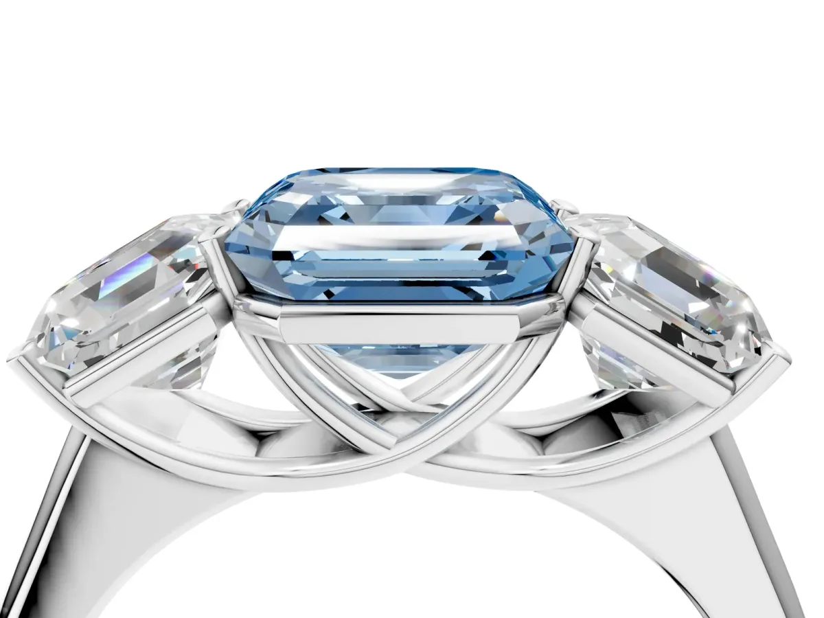 Fancy Blue Asscher Cut Three-Stone Diamond Ring with Prong Setting on a Classic Band Platinum