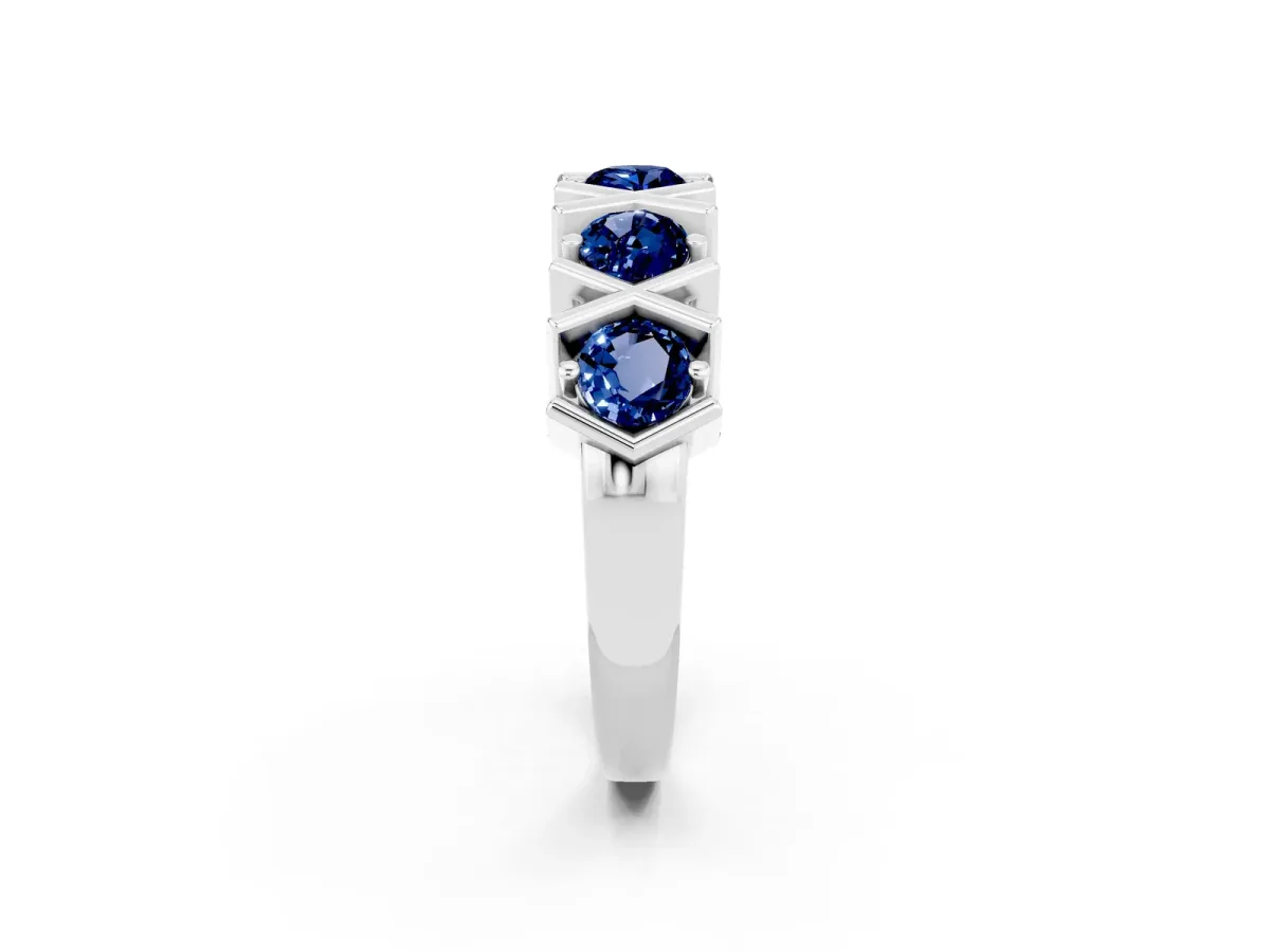 Round Blue Sapphire Channel Set Band with X-Prong Detail White gold