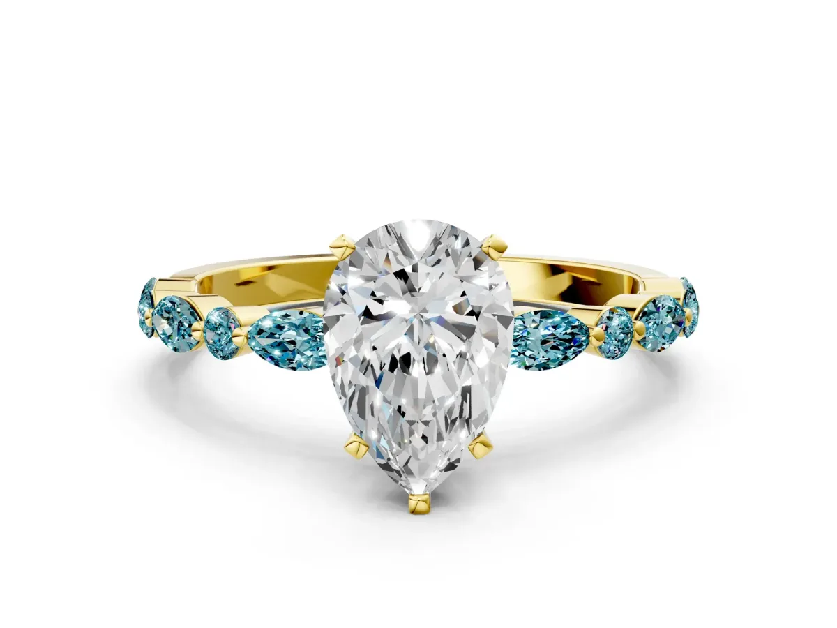Pear Cut Diamond Ring with Marquise and Round Blue Topaz Side Stones and Four-Prong Setting Yellow gold