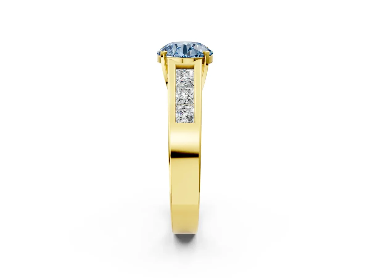 Fancy Blue Round Cut Cut Channel Set Solitaire Ring with Four-Prong Setting Yellow gold