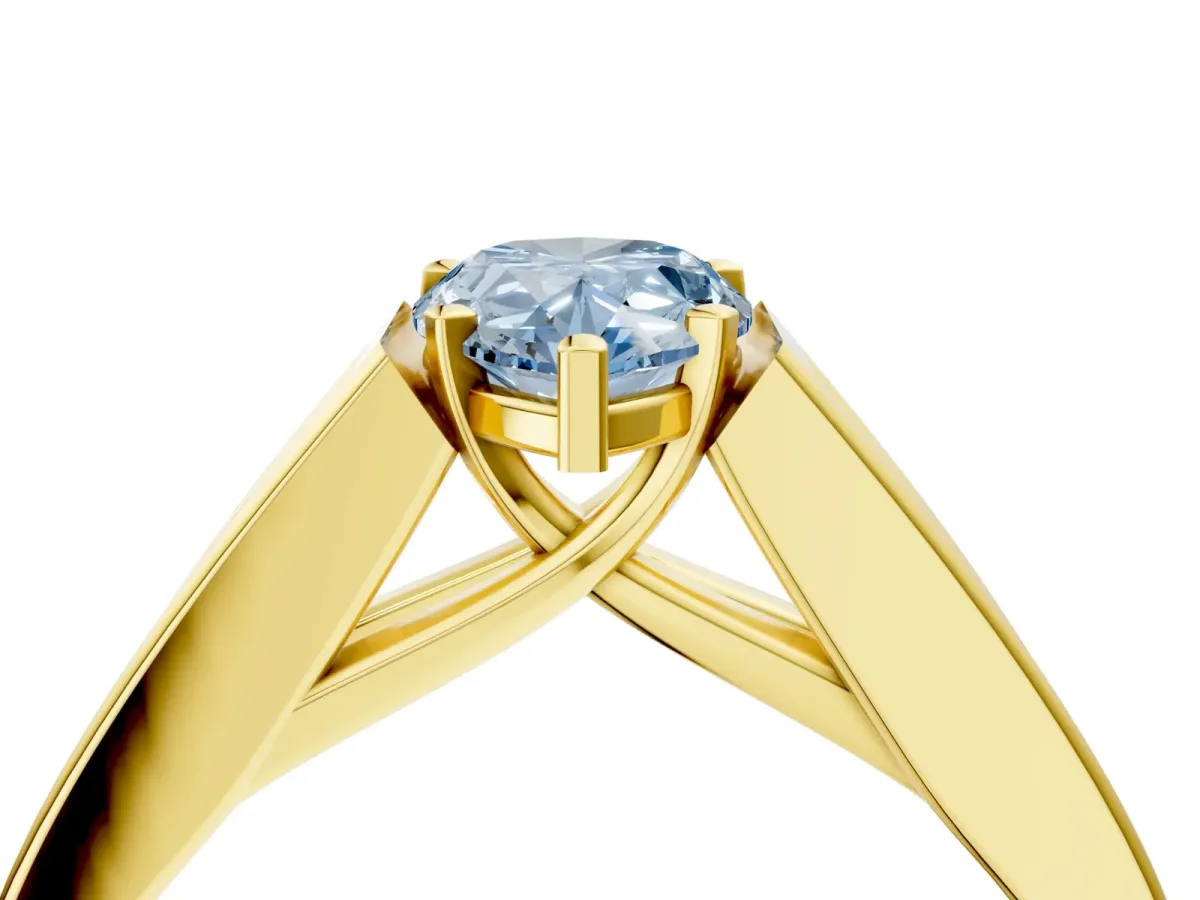 Fancy Blue Pear Cut Cut Channel Set Solitaire Ring with Four-Prong Setting Yellow gold