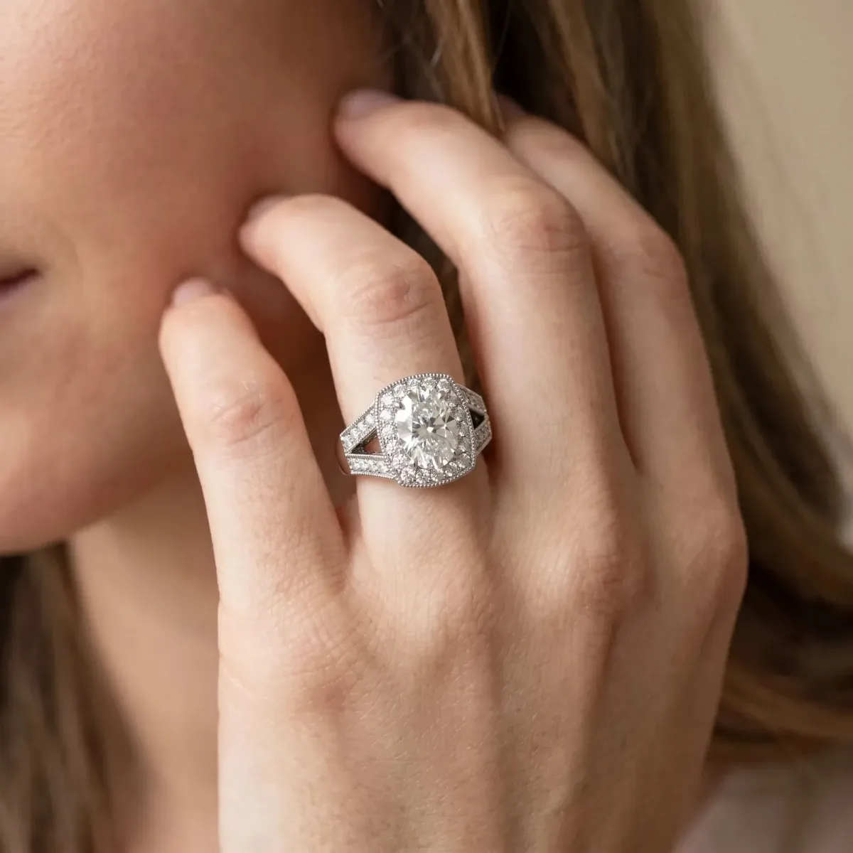Oval Cut Halo Split Shank Diamond Ring with Milgrain Prong Setting Platinum