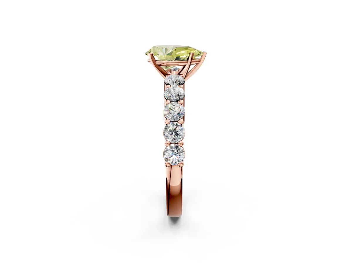 Fancy Yellow Pear Cut Diamond Solitaire Ring with Shared Prong Round Side Stones Rose gold