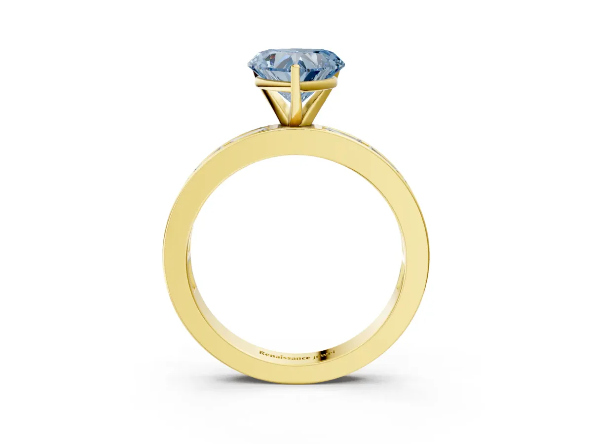 Fancy Blue Heart Cut Solitaire Diamond Ring with Channel-Set Baguette Band and Four-Prong Setting Yellow gold