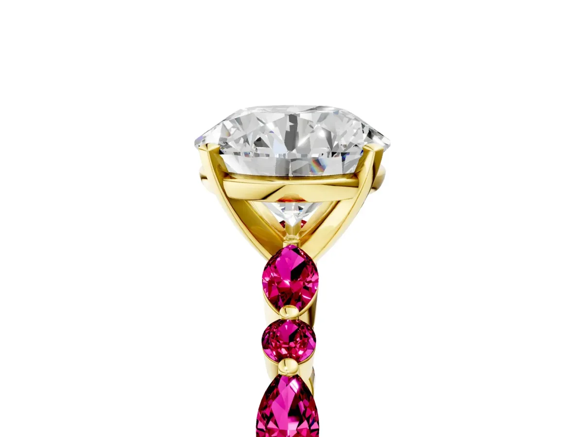 Round Cut Diamond Ring with Marquise and Round Garnet Side Stones and Four-Prong Setting Yellow gold