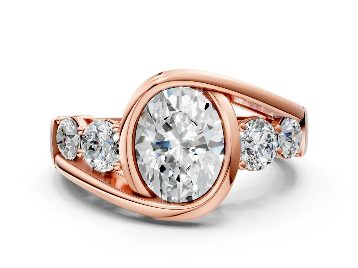 Bezel Set Oval Cut Diamond Bypass Ring with Round Accents Rose gold