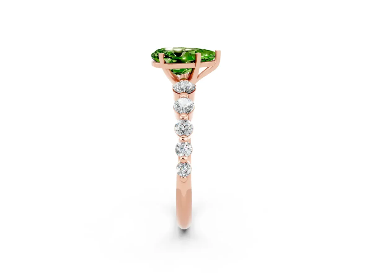 Pear Cut Solitaire Peridot Ring with Pave Band and Four-Prong Setting Rose gold