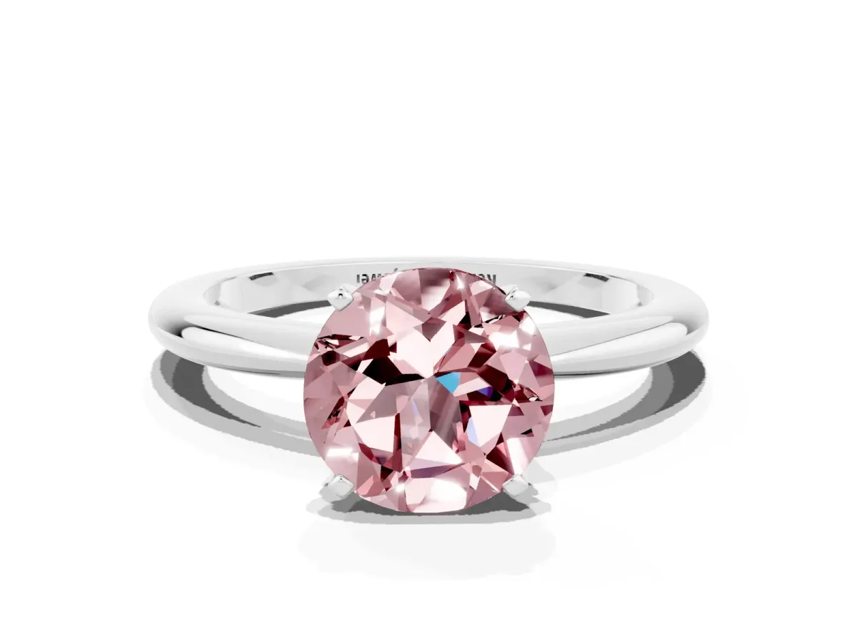 Round Cut Morganite Solitaire Ring with Six-Prong Setting and Classic Band Platinum
