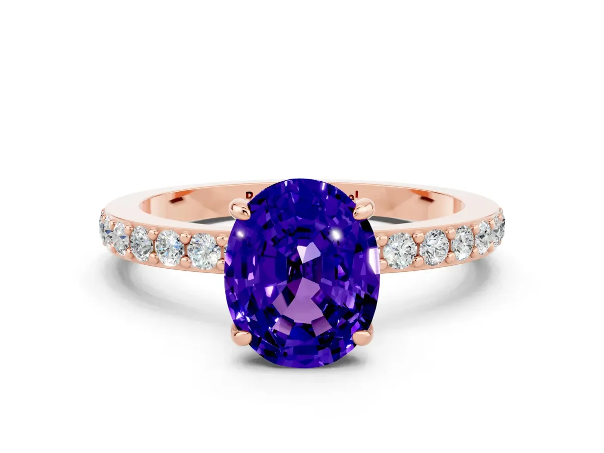 Oval Cut Tanzanite Solitaire Engagement Ring with Pavé Band and Four-Prong Setting Rose gold