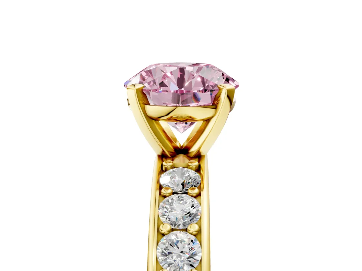 Fancy Pink Round Cut Diamond Engagement Ring with Channel Set Round Band and Prong Setting Yellow gold