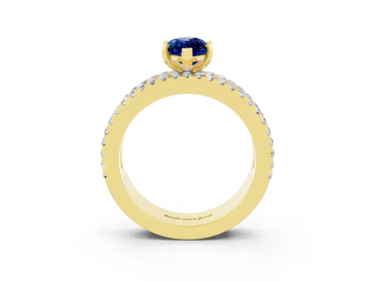 Marquise Cut Blue Sapphire Solitaire Ring with Pavé and Channel Set Band Yellow gold
