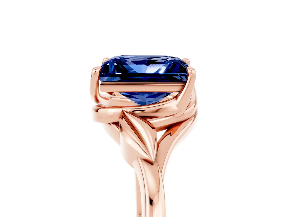 Princess Cut Blue Sapphire Solitaire Ring with Twist Band and Four-Prong Setting Rose gold