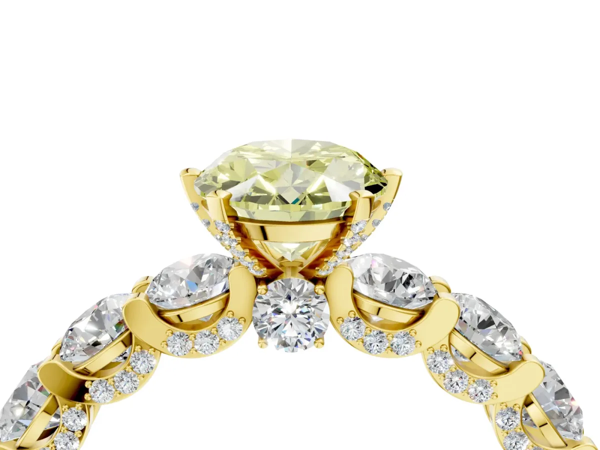 Fancy Yellow Oval Cut Diamond Side Stone Engagement Ring with Four-Prong Setting Yellow gold
