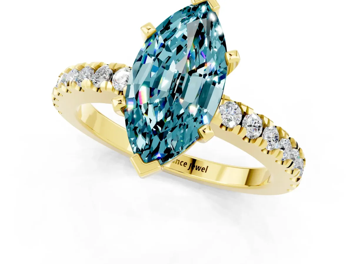 Marquise Cut Solitaire Blue Topaz with Pavé Band and Four-Prong Setting Yellow gold