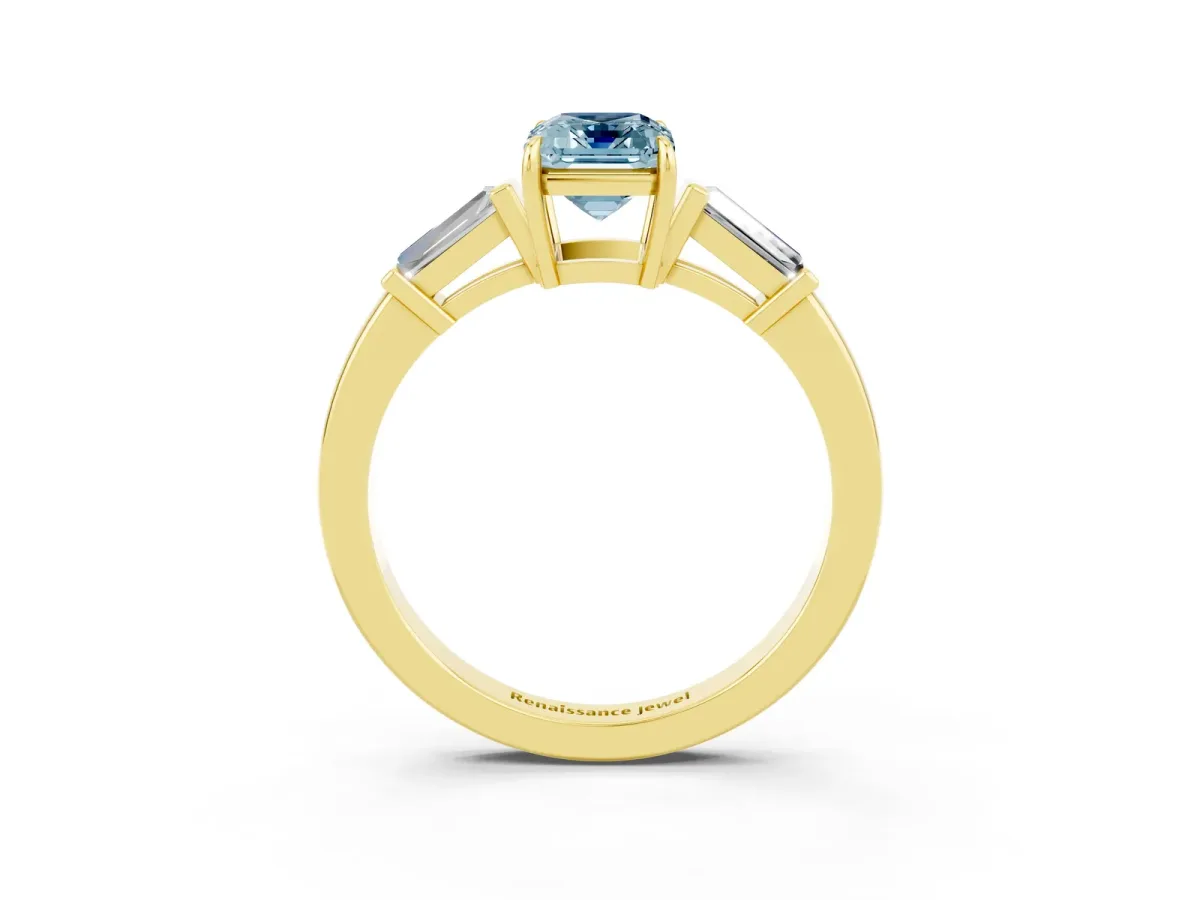 Emerald Cut Aquamarine Three-Stone Ring with Tapered Baguette Side Stones and Prong Setting Yellow gold