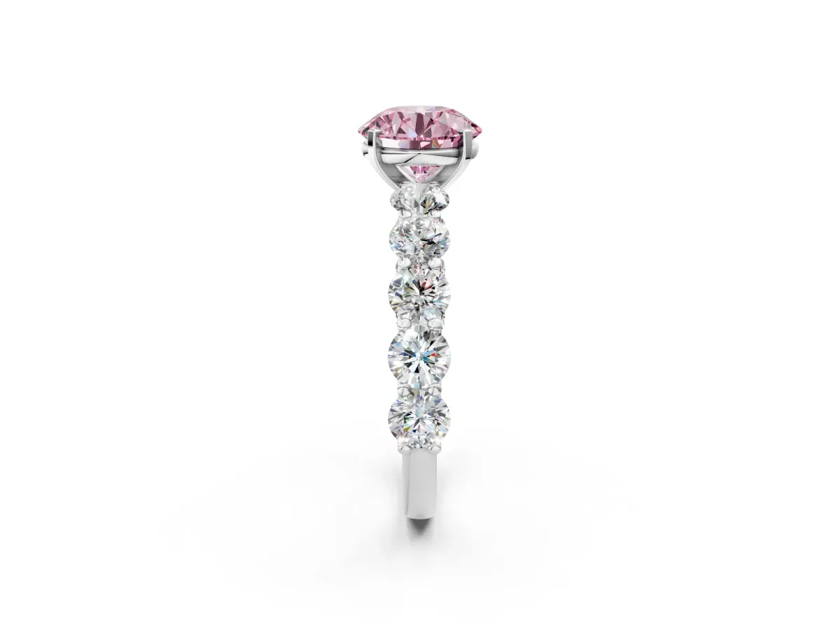 Fancy Pink Round Cut Diamond Prong Setting with Side Stones on a Pave Band Silver