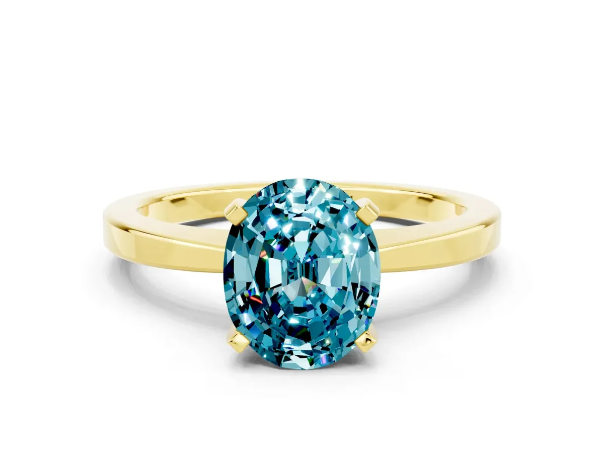 Oval Cut Blue Topaz Solitaire Engagement Ring with Classic Band and Four-Prong Setting Yellow gold