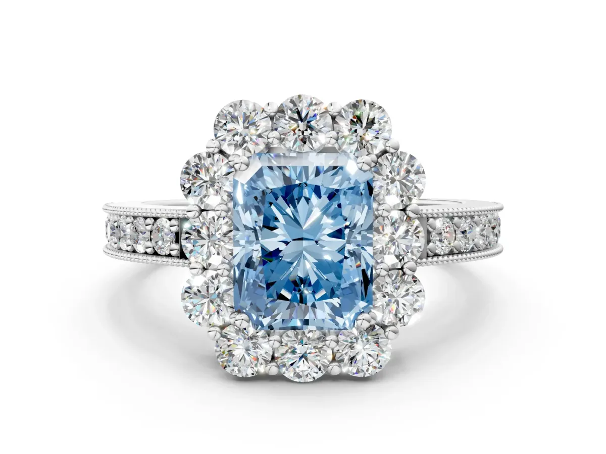 Fancy Blue Radiant Cut Cut Halo Diamond Pavé Engagement Ring with Milgrain Detailing Platinum