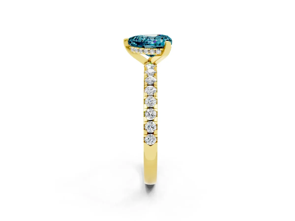Heart Cut Blue Topaz Solitaire Ring with Round Pavé Band and Four-Prong Setting Yellow gold