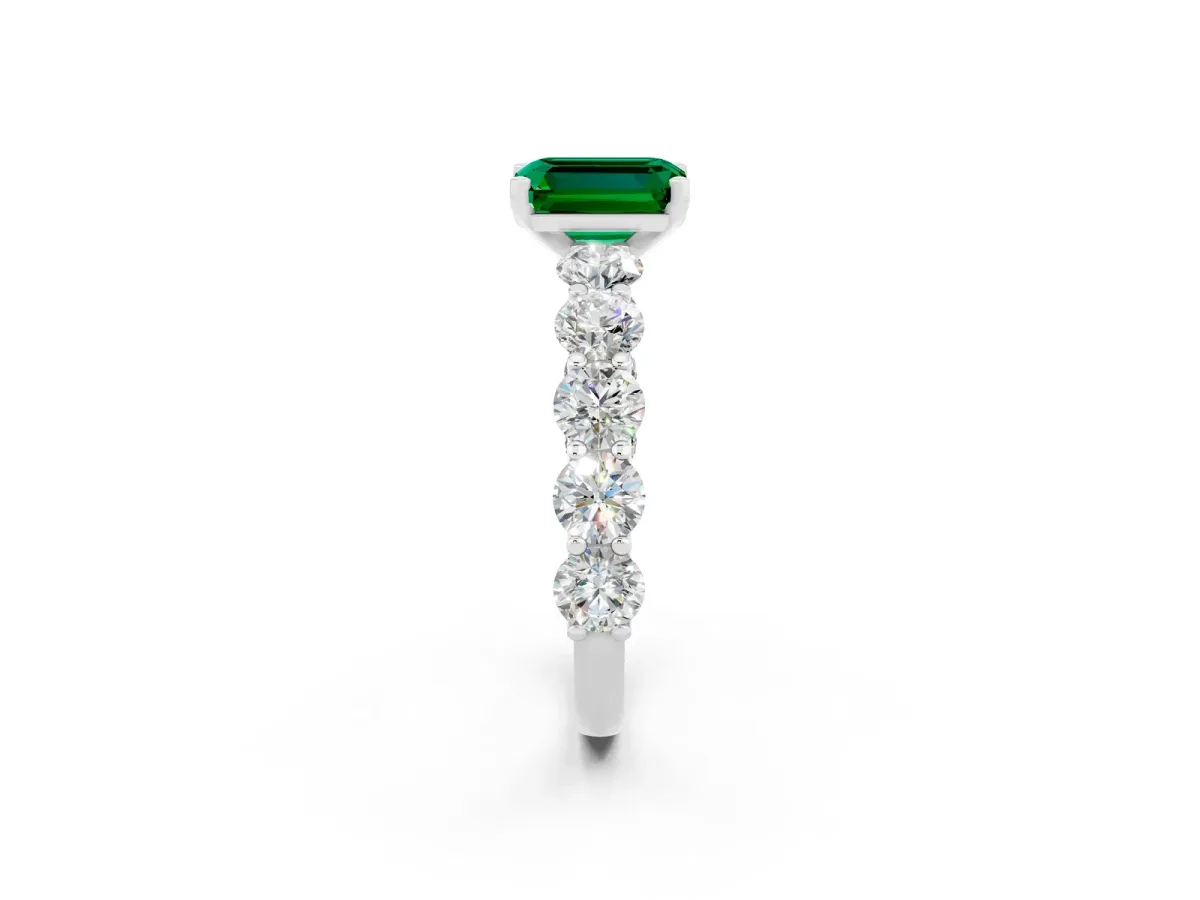 Emerald Cut Emerald Prong Setting with Side Stones on a Pave Band Silver