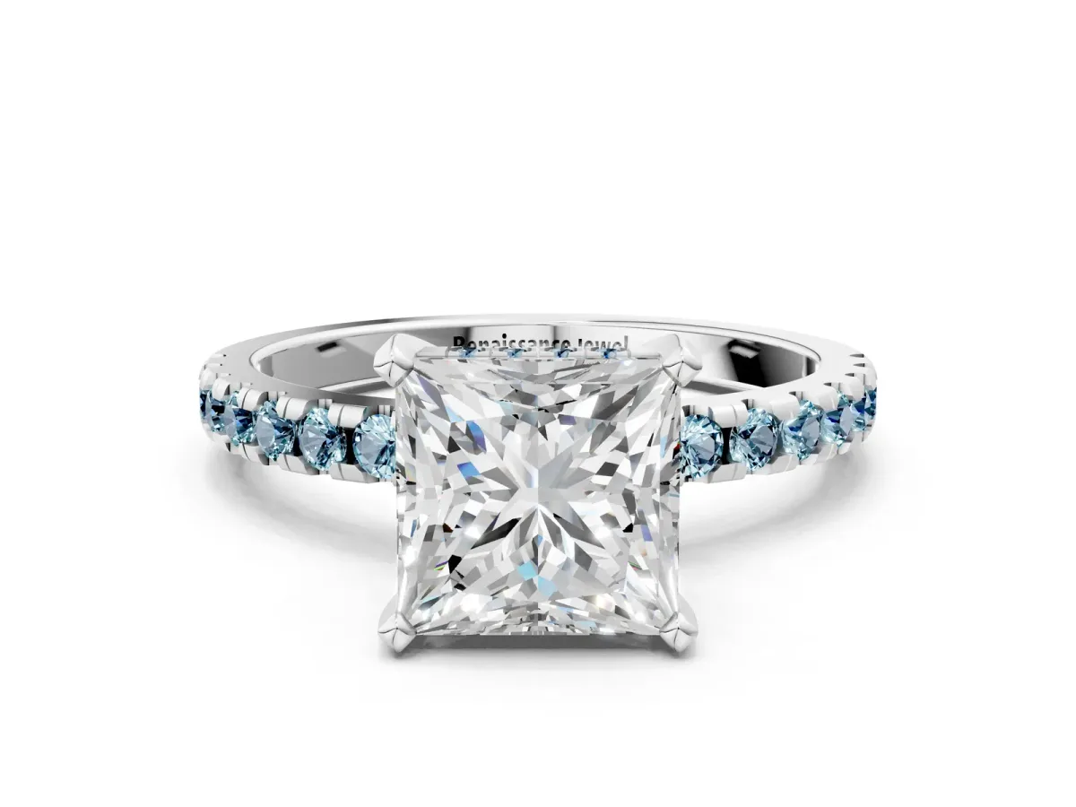 Princess Cut Diamond Solitaire Ring with Round Aquamarine Pavé Band and Four-Prong Setting Platinum