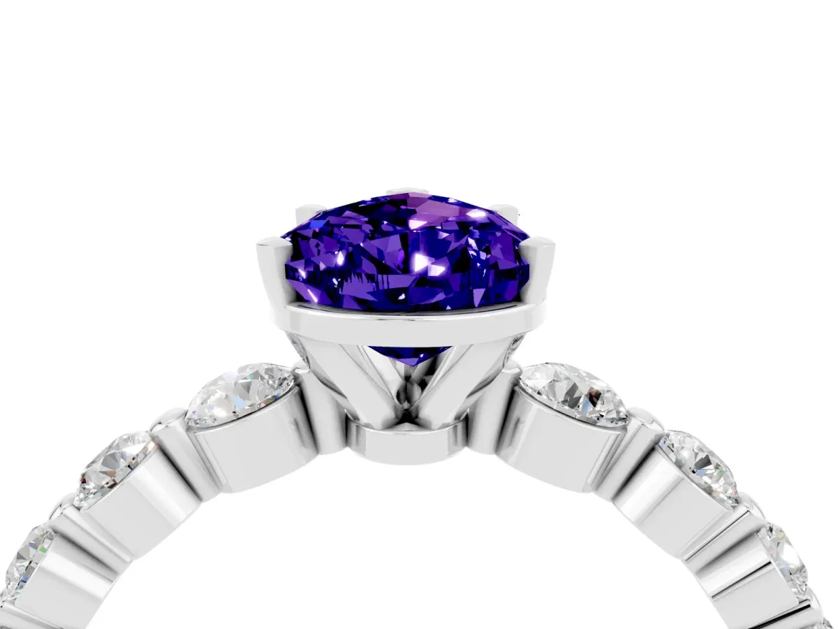 Pear Cut Solitaire Tanzanite Ring with Pave Band and Four-Prong Setting Silver
