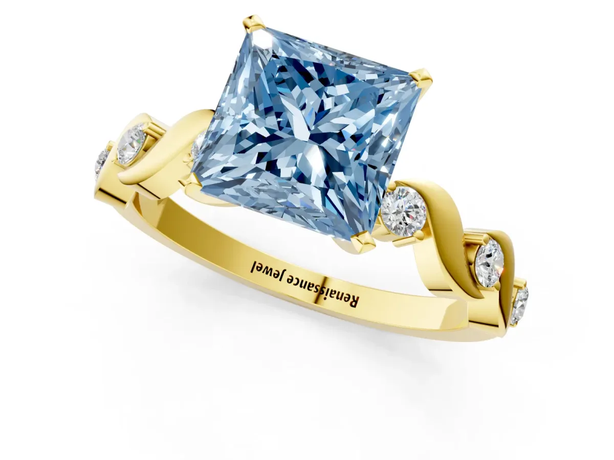 Fancy Blue Princess Cut Diamond Solitaire Twisted Band with Round Accents and Prong Setting Yellow gold