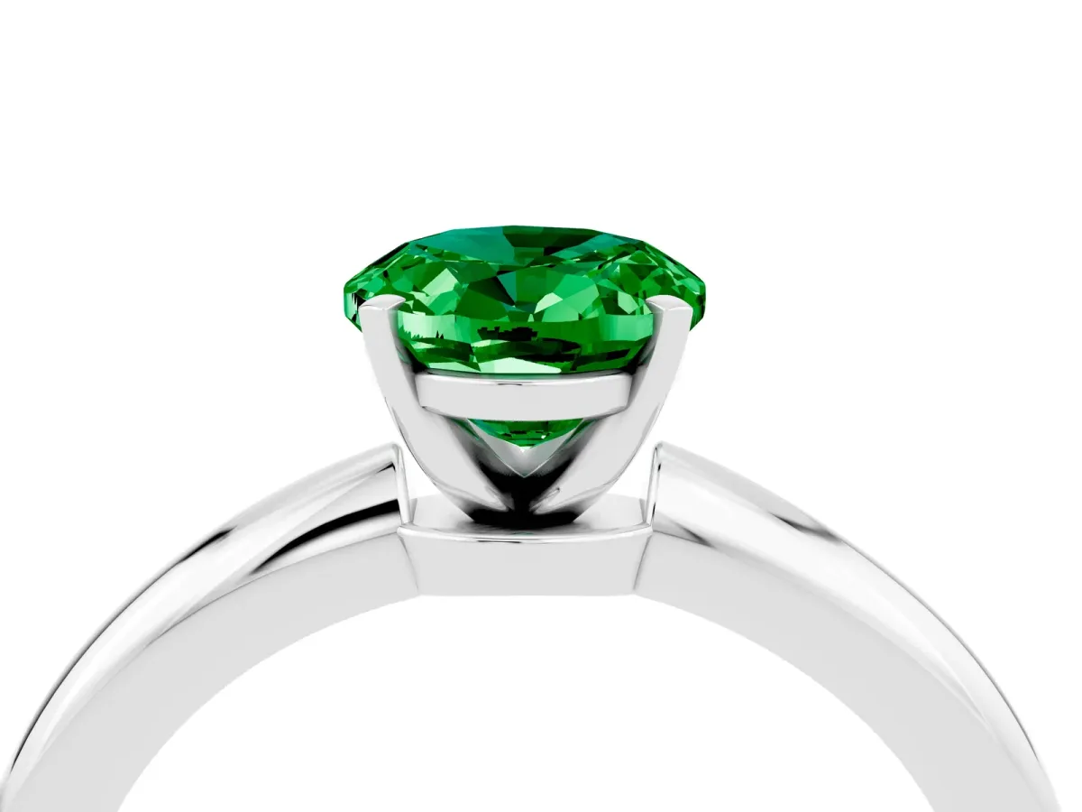 Oval Cut Emerald Solitaire Ring with Six-Prong Setting and Classic Band Silver