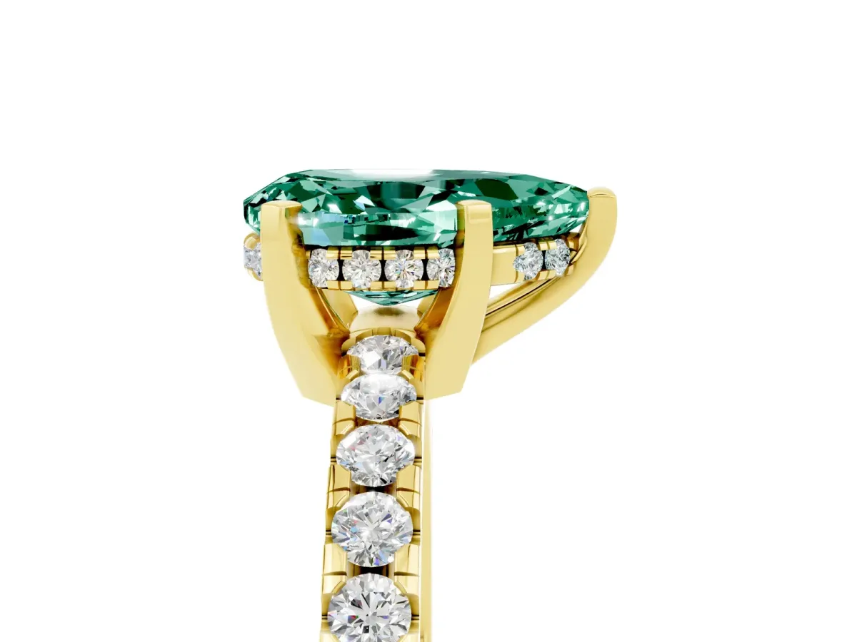 Pear Cut Green Sapphire Solitaire Ring with Round Pavé Band and Four-Prong Setting Yellow gold