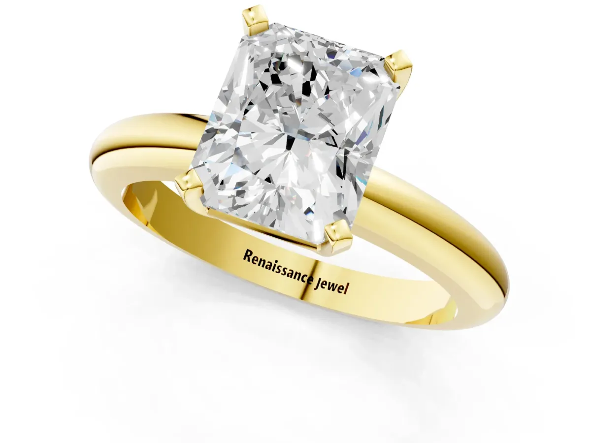 Radiant Cut Diamond Solitaire Engagement Ring with Round Band and Four-Prong Setting Yellow gold