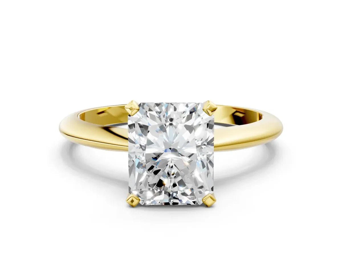 Radiant Cut Diamond Solitaire Engagement Ring with Classic Band and Four-Prong Setting Yellow gold