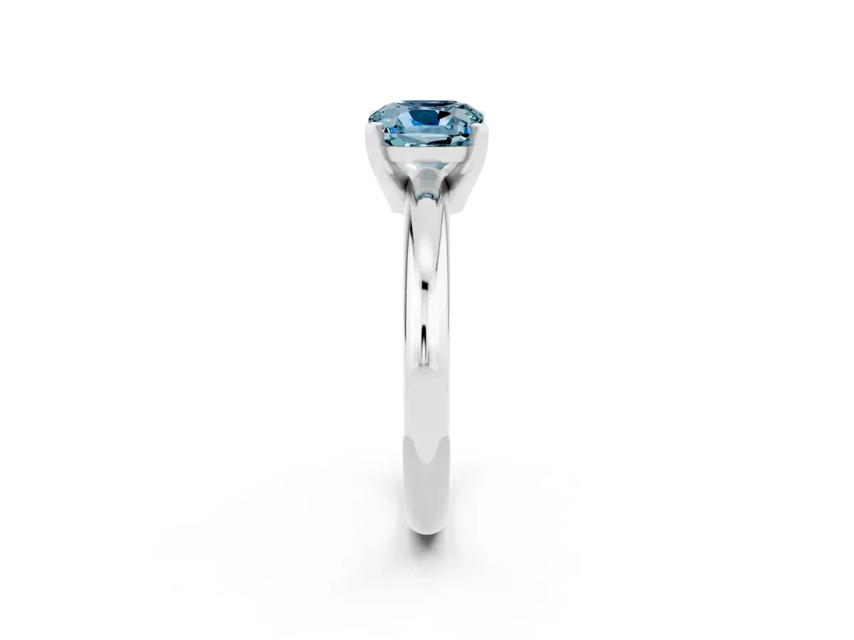 Cushion Cut Aquamarine Solitaire Engagement Ring with Round Band and Four-Prong Setting White gold