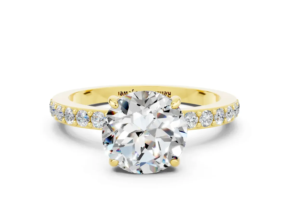 Round Cut Moissanite Solitaire Engagement Ring with Pavé Band and Four-Prong Setting Yellow gold