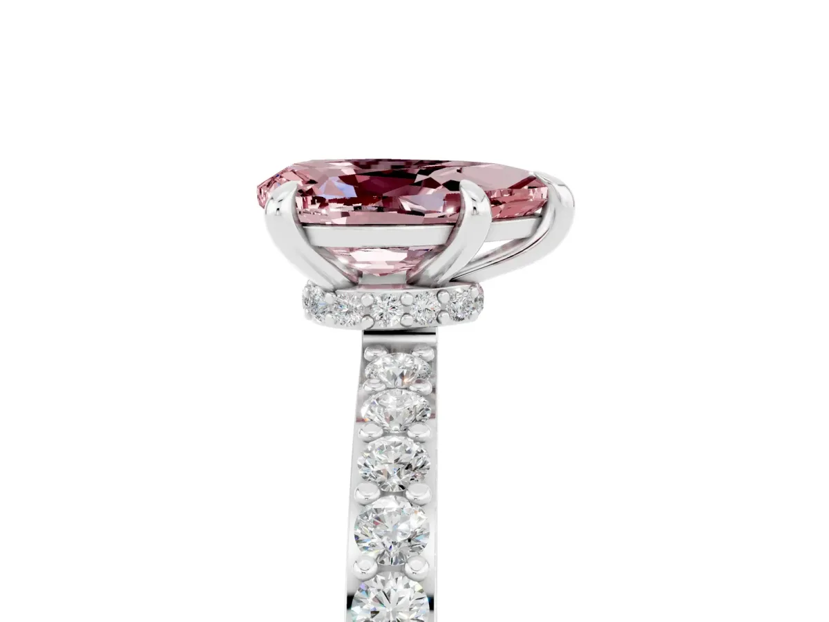 Pear Cut Morganite Solitaire Engagement Ring with Pavé Band and Four-Prong Setting Silver
