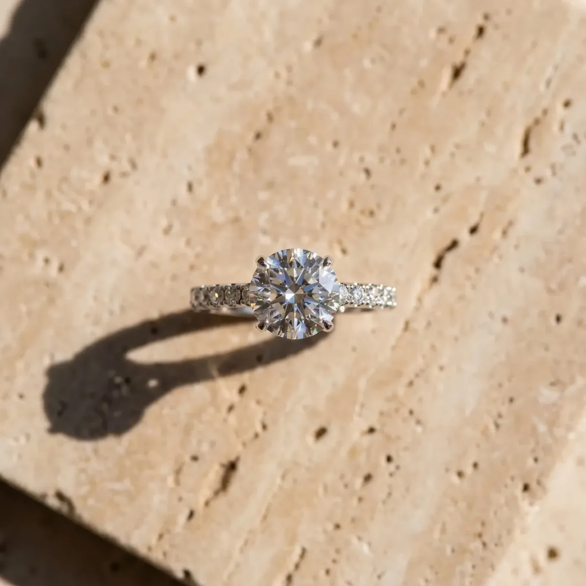 Round Cut Diamond Solitaire Pavé Band with Four-Prong Setting Silver