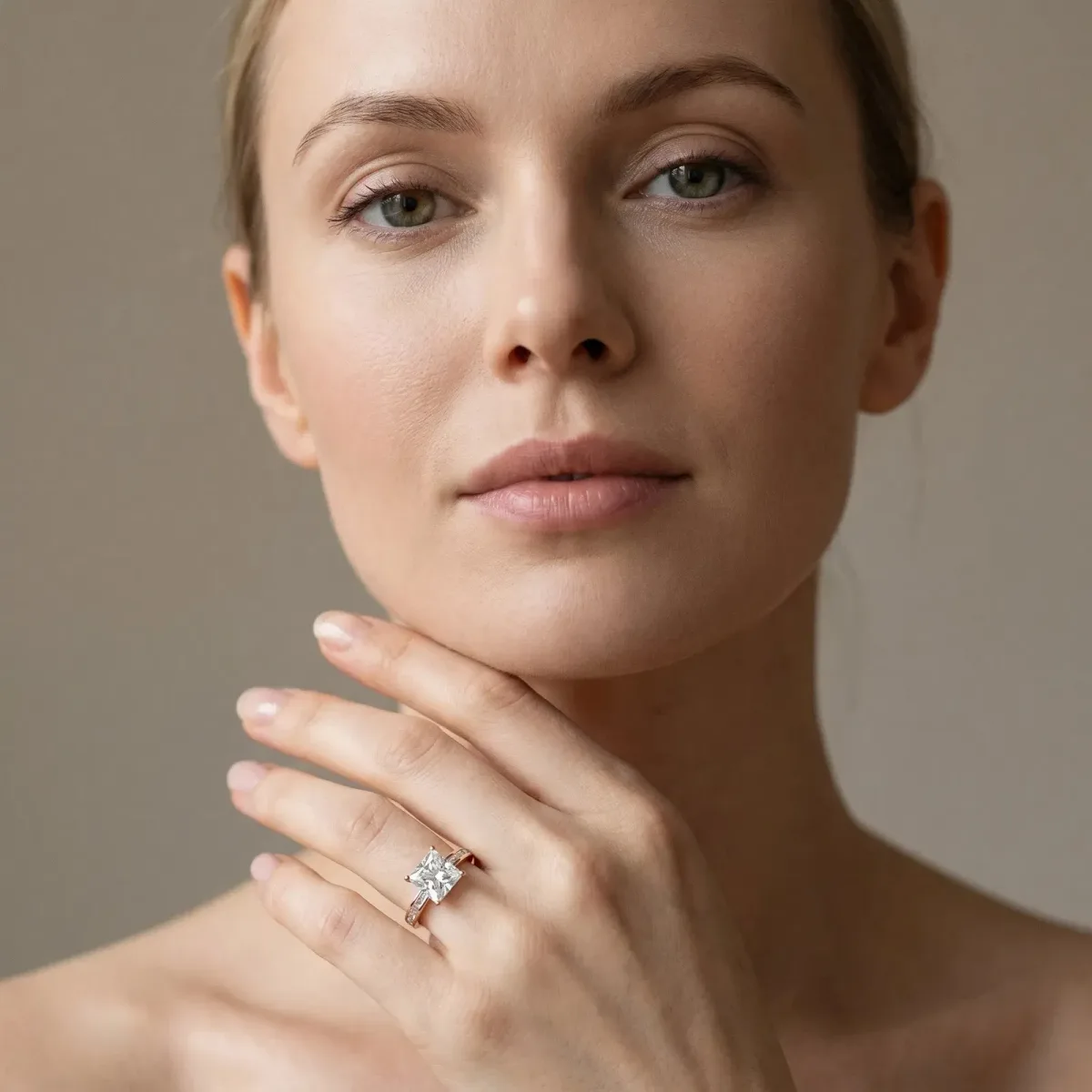Princess Cut Solitaire Diamond Ring with Channel-Set Baguette Band and Four-Prong Setting Rose gold