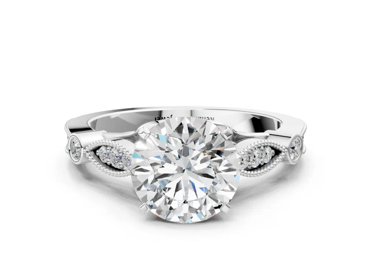 Round Cut Cut Diamond with Milgrain Marquise and Bezel Accents on a Solitaire Band with Prong Setting Silver
