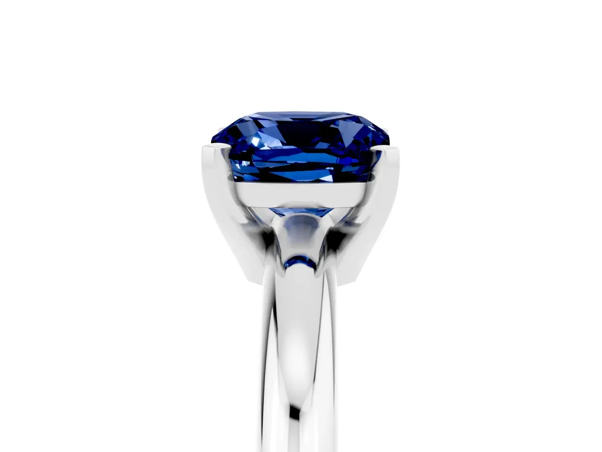 Cushion Cut Blue Sapphire Solitaire Engagement Ring with Round Band and Four-Prong Setting White gold
