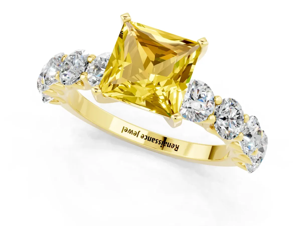 Princess Cut Yellow Sapphire Prong Setting with Side Stones on a Pave Band Yellow gold