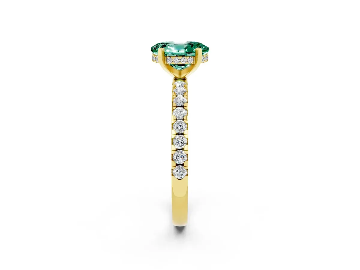 Oval Cut Green Sapphire Solitaire Ring with Round Pavé Band and Four-Prong Setting Yellow gold